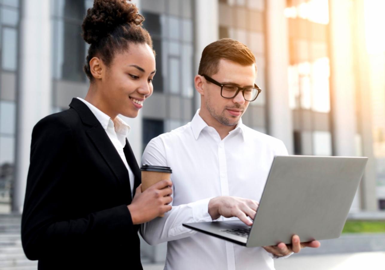 Business professional working with automated financial systems and digital workflows